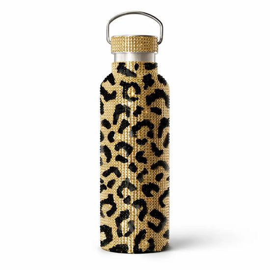 A gold and black leopard-print water bottle adorned with sparkling rhinestones, featuring a metallic silver cap and handle.