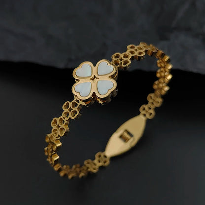 New four-leaf clover white shell hollow stainless steel gold-plated bracelet high-quality waterproof silver for girls