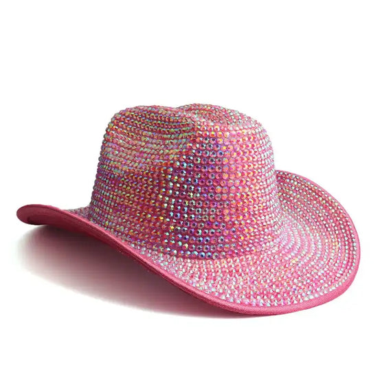 Pink rhinestone cowboy hat with wide brim and leather band.