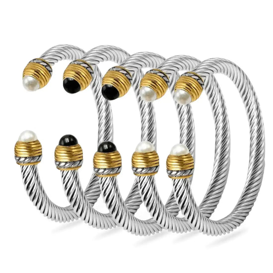 Silver and gold twisted cable bangle with pearl accents, david yurman style.