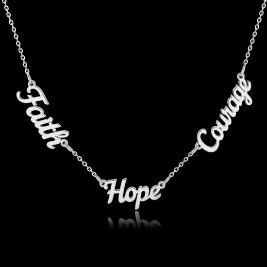 Silver necklace with three nameplate pendants.