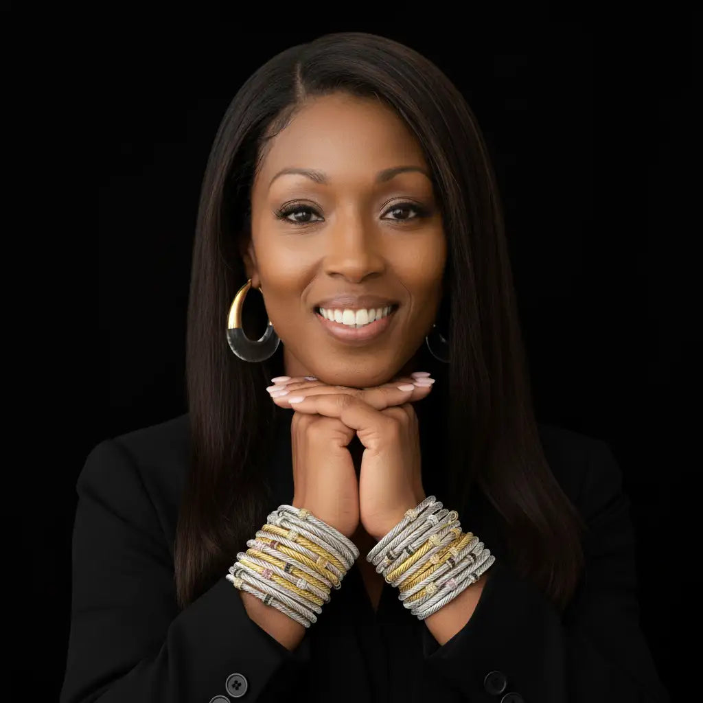 Stacked silver and gold-toned braided cuff bracelets